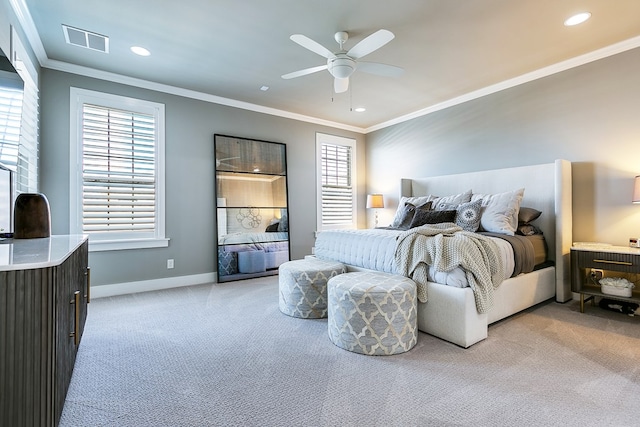 bedroom with visible vents, light carpet, ornamental molding, recessed lighting, and baseboards