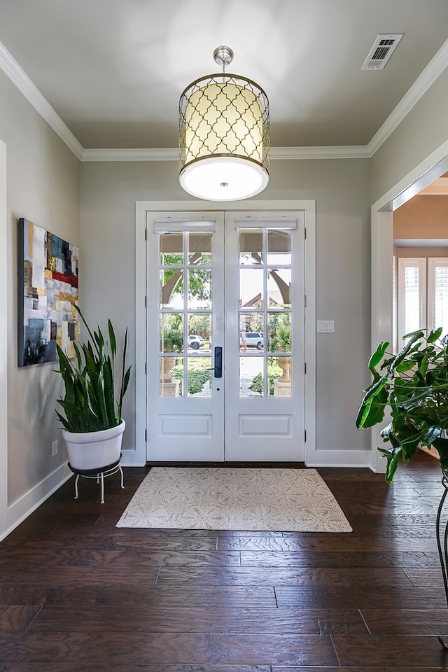 entryway featuring visible vents, french doors, crown molding, and hardwood / wood-style flooring