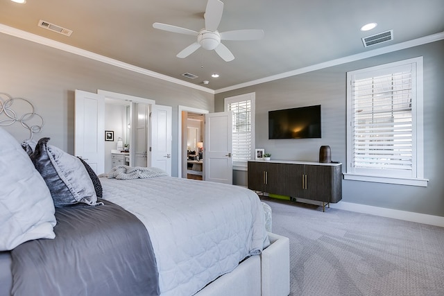 bedroom with visible vents, light carpet, and ornamental molding