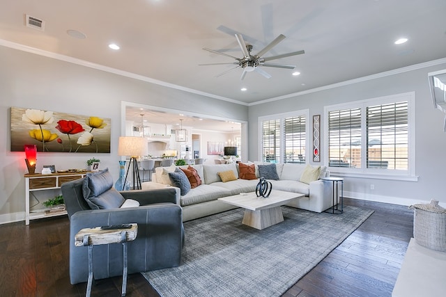 living room with baseboards, wood-type flooring, ceiling fan, and ornamental molding