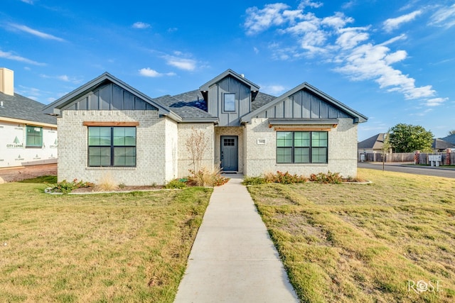 view of front of home with a front lawn