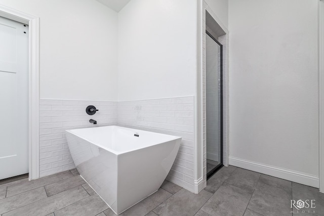 bathroom featuring a tub