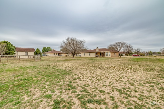 view of yard with fence