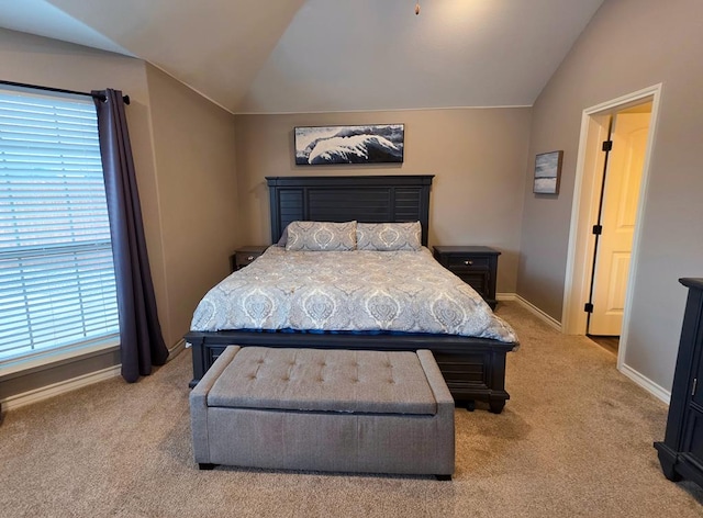 1901 Chesney Ln, San Angelo, TX 76904 - carpeted bedroom featuring lofted ceiling and baseboards
