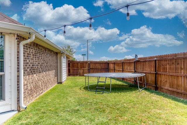 1901 Chesney Ln, San Angelo, TX 76904 - view of yard with a trampoline
