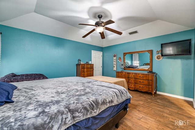 3405 Shadyhill Dr, San Angelo, TX 76904 - bedroom with vaulted ceiling, wood finished floors, ceiling fan, and baseboards