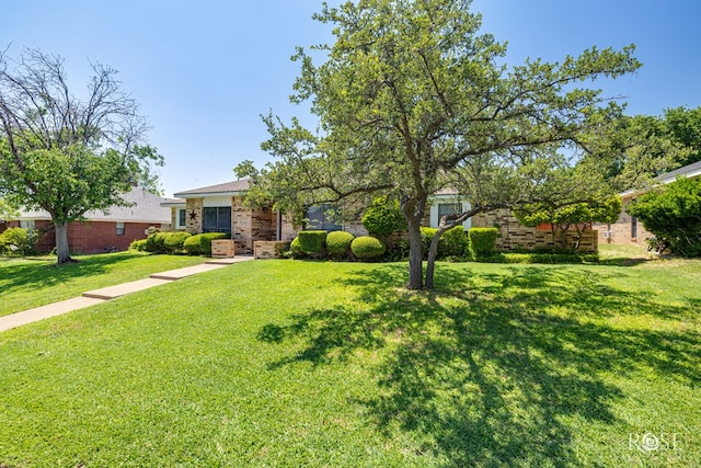 3405 Shadyhill Dr, San Angelo, TX 76904 - view of front of property featuring brick siding and a front yard