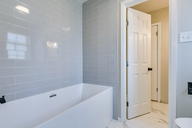 bathroom featuring a washtub