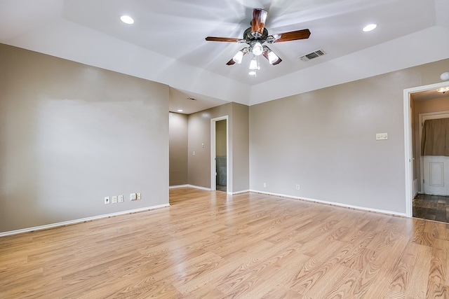 spare room with ceiling fan and light hardwood / wood-style flooring