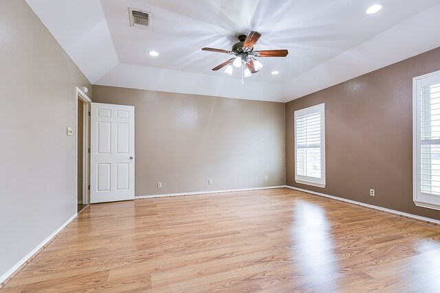 spare room featuring ceiling fan and light hardwood / wood-style floors