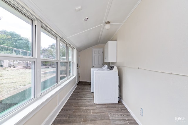 laundry area with cabinets, dark wood-type flooring, and independent washer and dryer