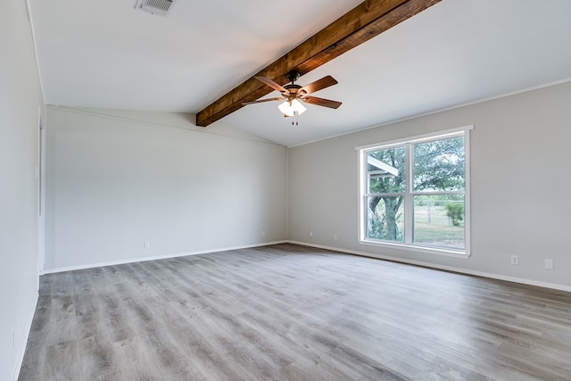 unfurnished room featuring ceiling fan, light hardwood / wood-style floors, and vaulted ceiling with beams