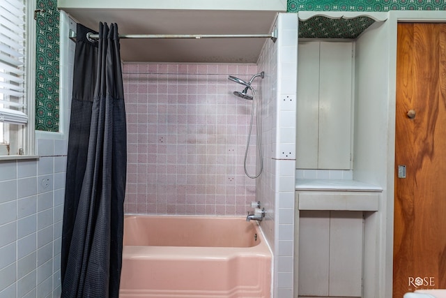 bathroom featuring shower / bath combination with curtain