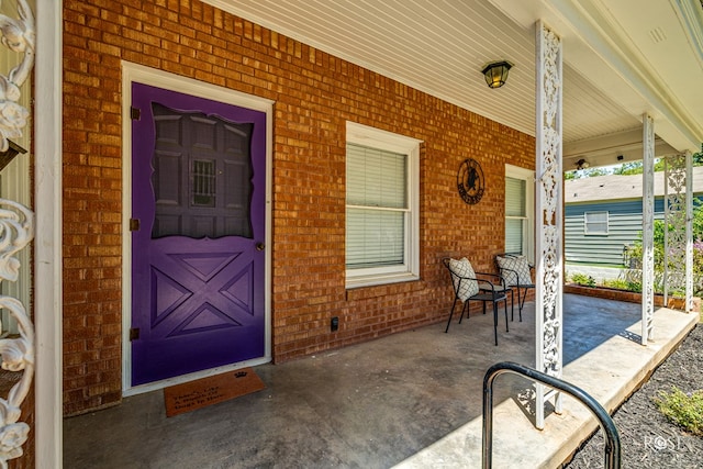 view of patio featuring a porch