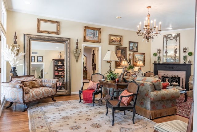 2611 Live Oak St, San Angelo, TX 76901 - living area with a chandelier, light wood-style floors, crown molding, and a fireplace