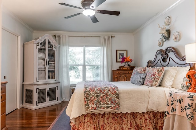 2611 Live Oak St, San Angelo, TX 76901 - bedroom featuring ornamental molding, wood finished floors, and ceiling fan