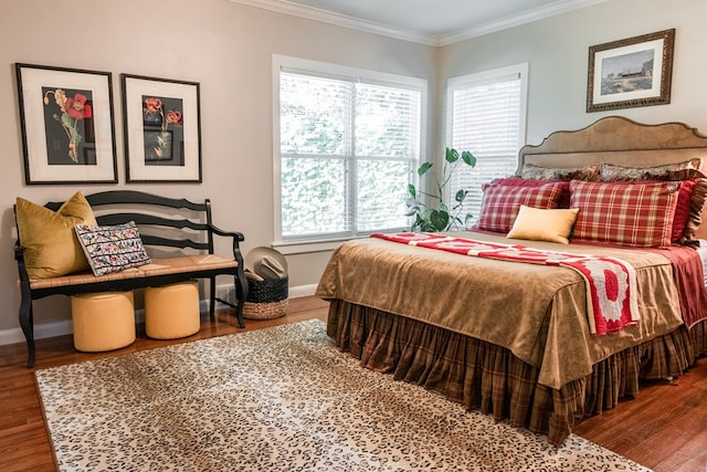2611 Live Oak St, San Angelo, TX 76901 - bedroom with wood finished floors and crown molding