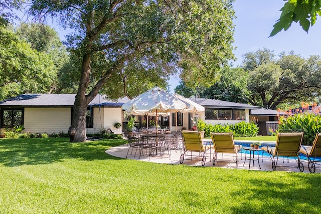 2611 Live Oak St, San Angelo, TX 76901 - back of property featuring a patio area