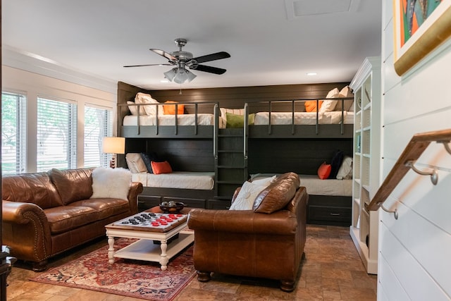 2611 Live Oak St, San Angelo, TX 76901 - living area with stone finish flooring and ceiling fan