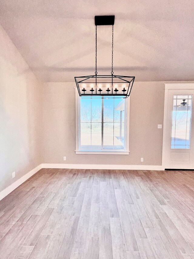 unfurnished dining area with hardwood / wood-style floors