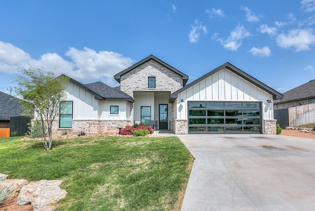 view of front of property with an attached garage, board and batten siding, fence, and concrete driveway