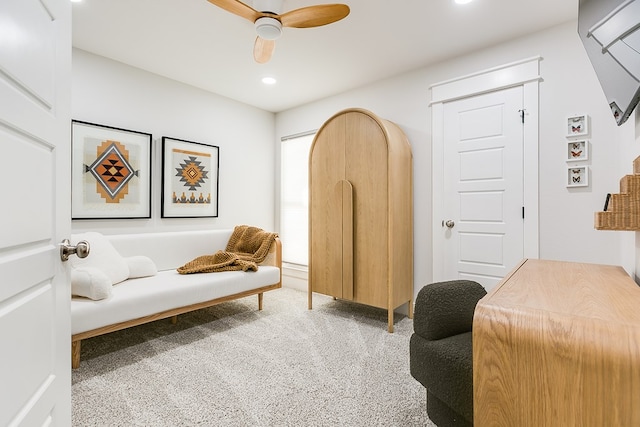 living area featuring carpet flooring, recessed lighting, and ceiling fan