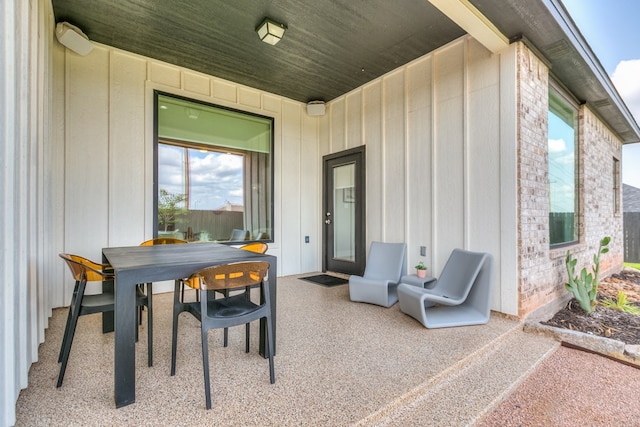 view of patio with outdoor dining area