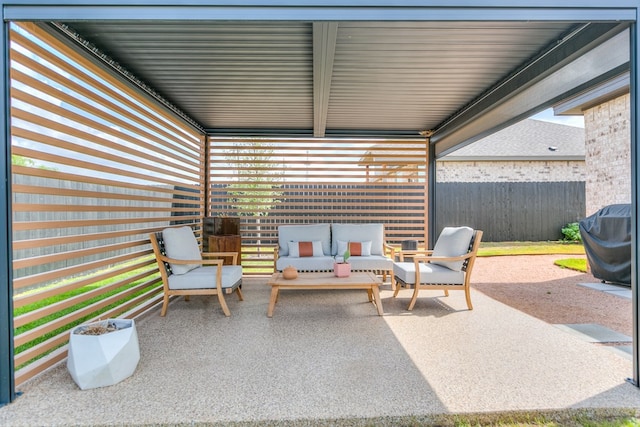 view of patio / terrace with outdoor lounge area, fence, and a grill