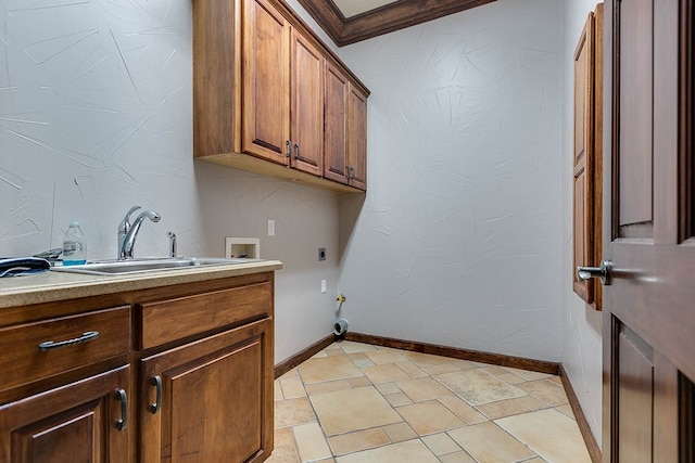 clothes washing area with sink, cabinets, electric dryer hookup, washer hookup, and hookup for a gas dryer