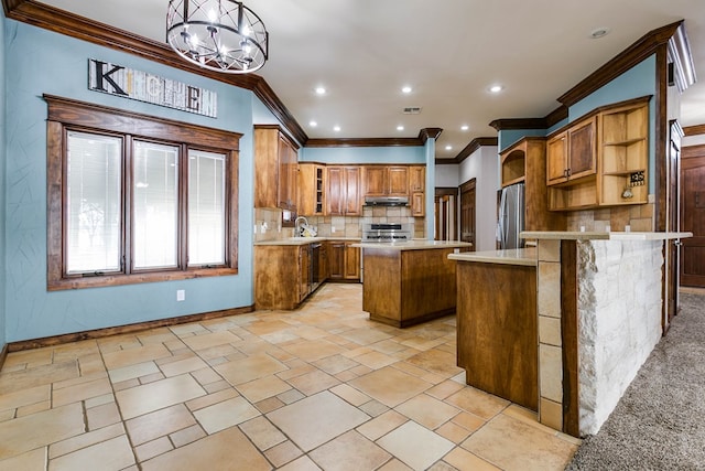 kitchen with sink, a center island, stainless steel fridge, pendant lighting, and stove