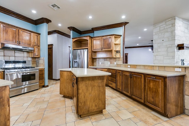 kitchen with crown molding, decorative backsplash, stainless steel appliances, and a kitchen island