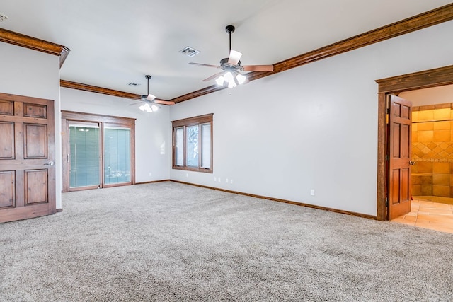 unfurnished living room featuring crown molding, ceiling fan, and light carpet