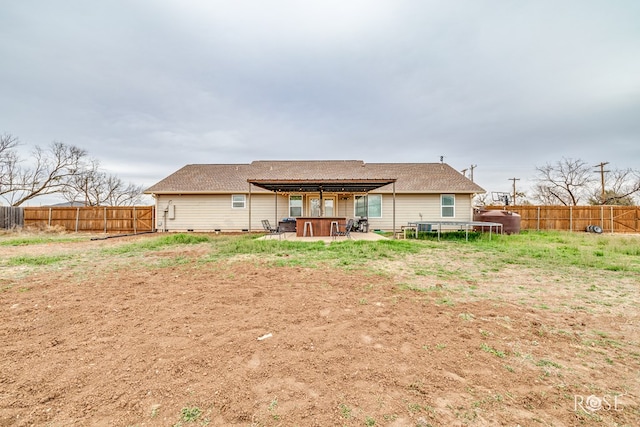 1335 Reece Rd, San Angelo, TX 76904 - back of house with a fenced backyard and a patio area