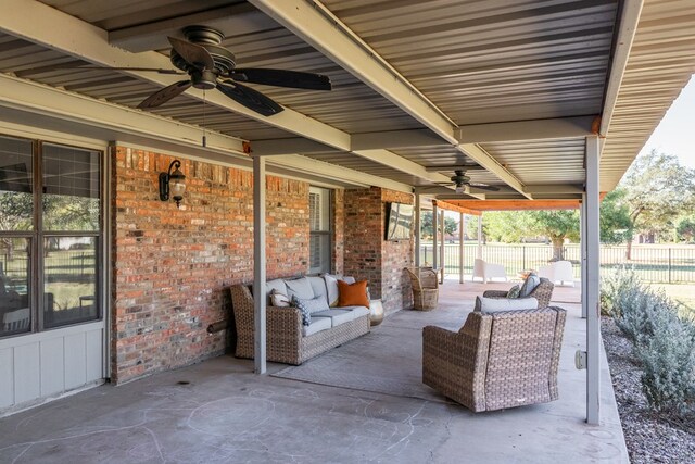 view of patio featuring an outdoor hangout area and ceiling fan