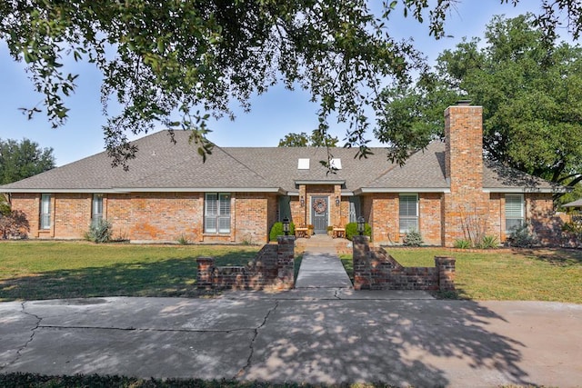 ranch-style house with a front yard