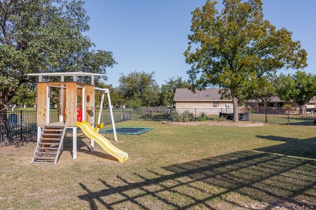 view of jungle gym featuring a yard