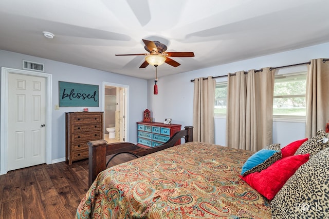 bedroom with dark hardwood / wood-style floors, ceiling fan, and ensuite bath