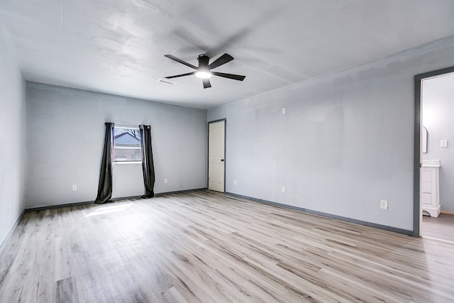 512 Ave J, Ozona, TX 76943 - unfurnished room featuring baseboards, light wood-type flooring, and ceiling fan