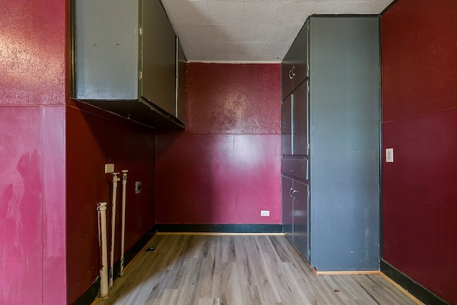 512 Ave J, Ozona, TX 76943 - interior space with light wood-style flooring and baseboards