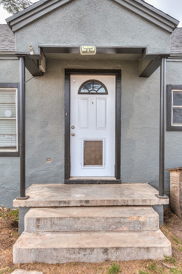 512 Ave J, Ozona, TX 76943 - entrance to property with stucco siding