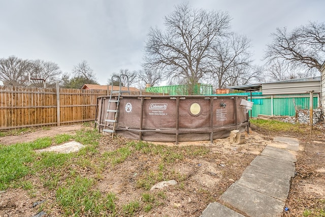 512 Ave J, Ozona, TX 76943 - view of yard featuring a fenced backyard