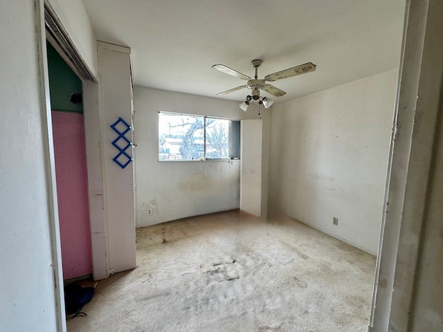 unfurnished bedroom with ceiling fan