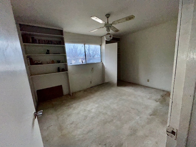 unfurnished bedroom with ceiling fan