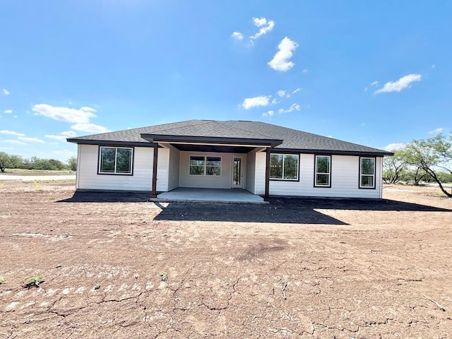 rear view of house with a patio