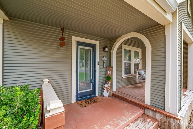 entrance to property with a porch