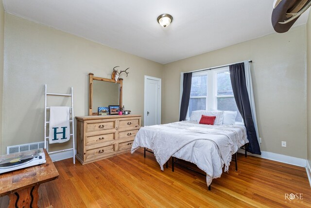 bedroom featuring hardwood / wood-style floors