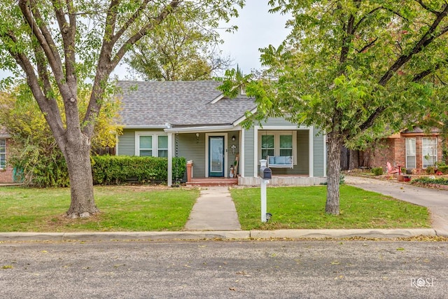 view of front of home with a front lawn