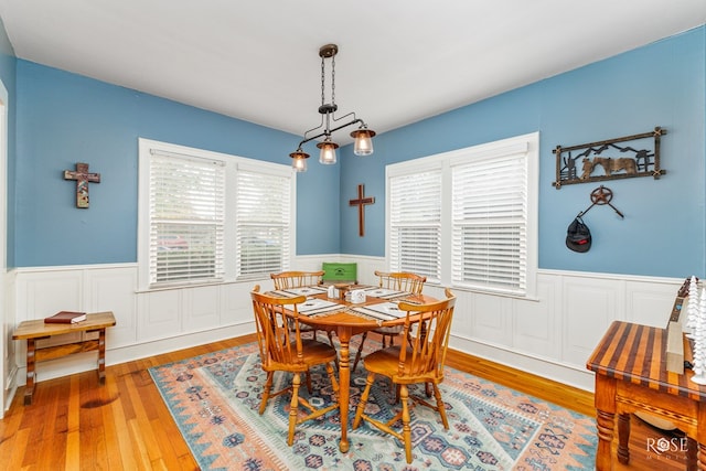 dining area with hardwood / wood-style flooring