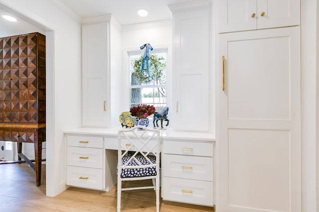 2121 Sul Ross St, San Angelo, TX 76904 - bar featuring crown molding, light wood-style flooring, and recessed lighting