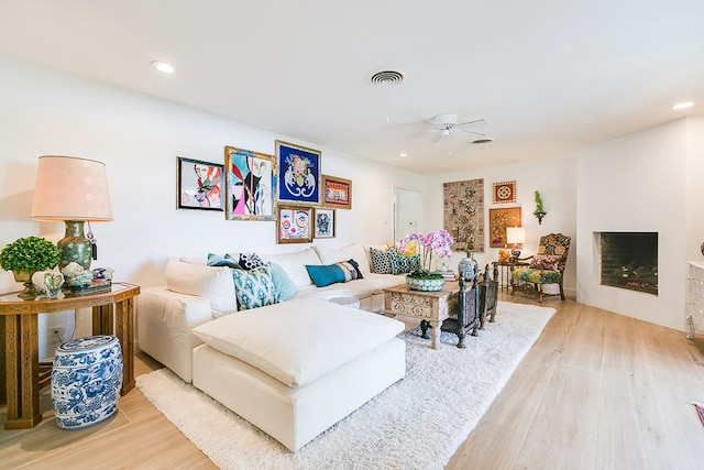 2121 Sul Ross St, San Angelo, TX 76904 - living area featuring light wood-style floors, a ceiling fan, and recessed lighting